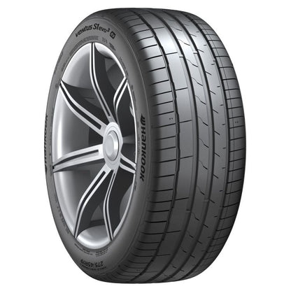 Car tire with rim on a white background