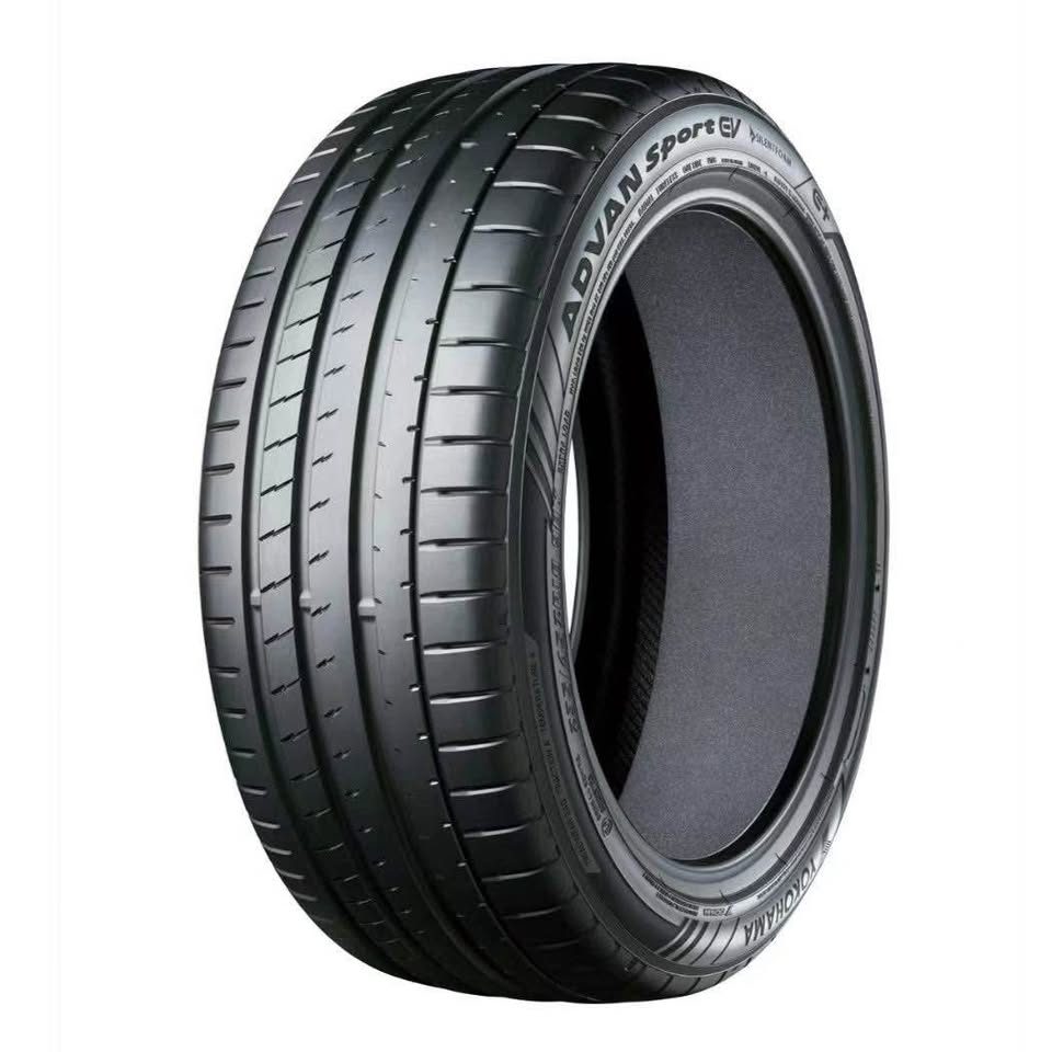 Car tire with 'Advan Sport' branding on a white background