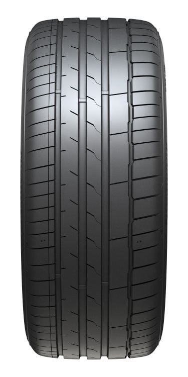 Car tire with tread pattern on a white background