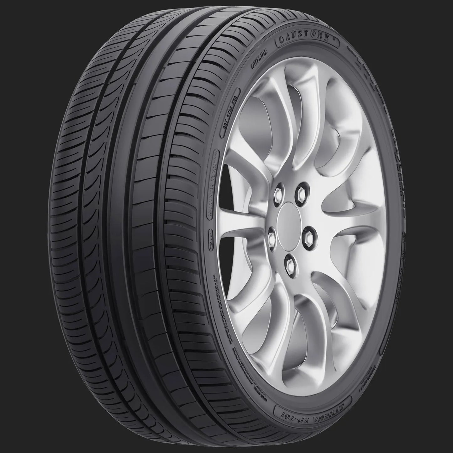 Car tire with silver alloy wheel on a black background