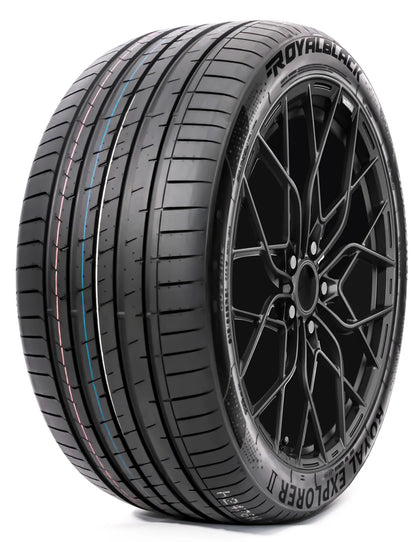 Car tire with black rim on a white background